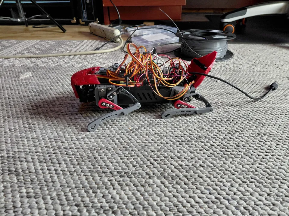 The assembled prototype resting low on the carpet during development.