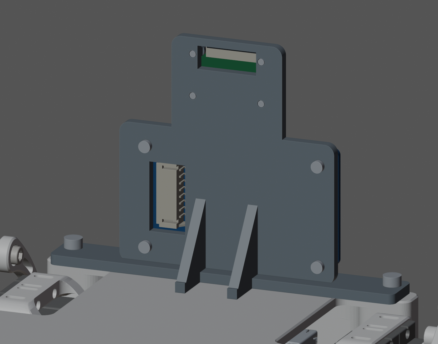 Rear view of the camera/display carrier showing the standoffs and cable openings.